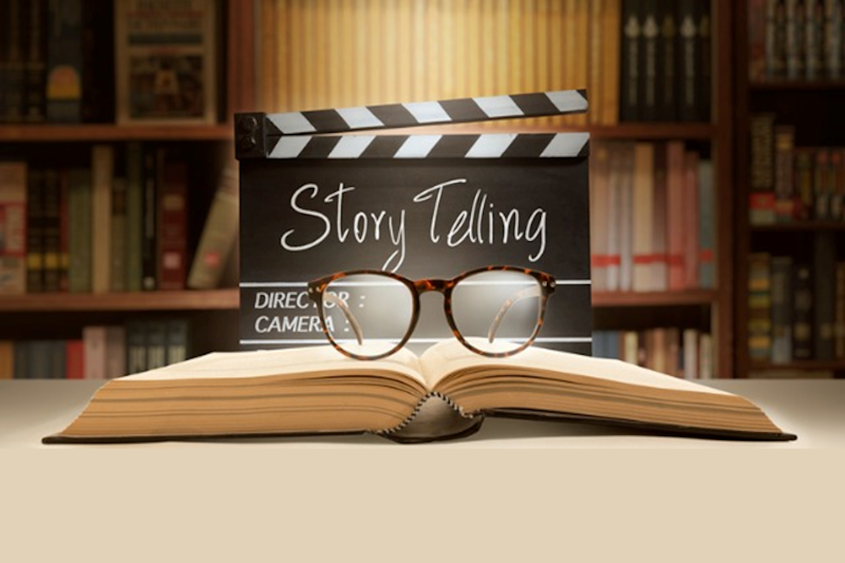 Open book with Story Telling director clapper - No Story, No Glory